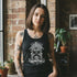 Black tank top with a graphic design of a skeleton on a throne and 'Small Town Ink' text.